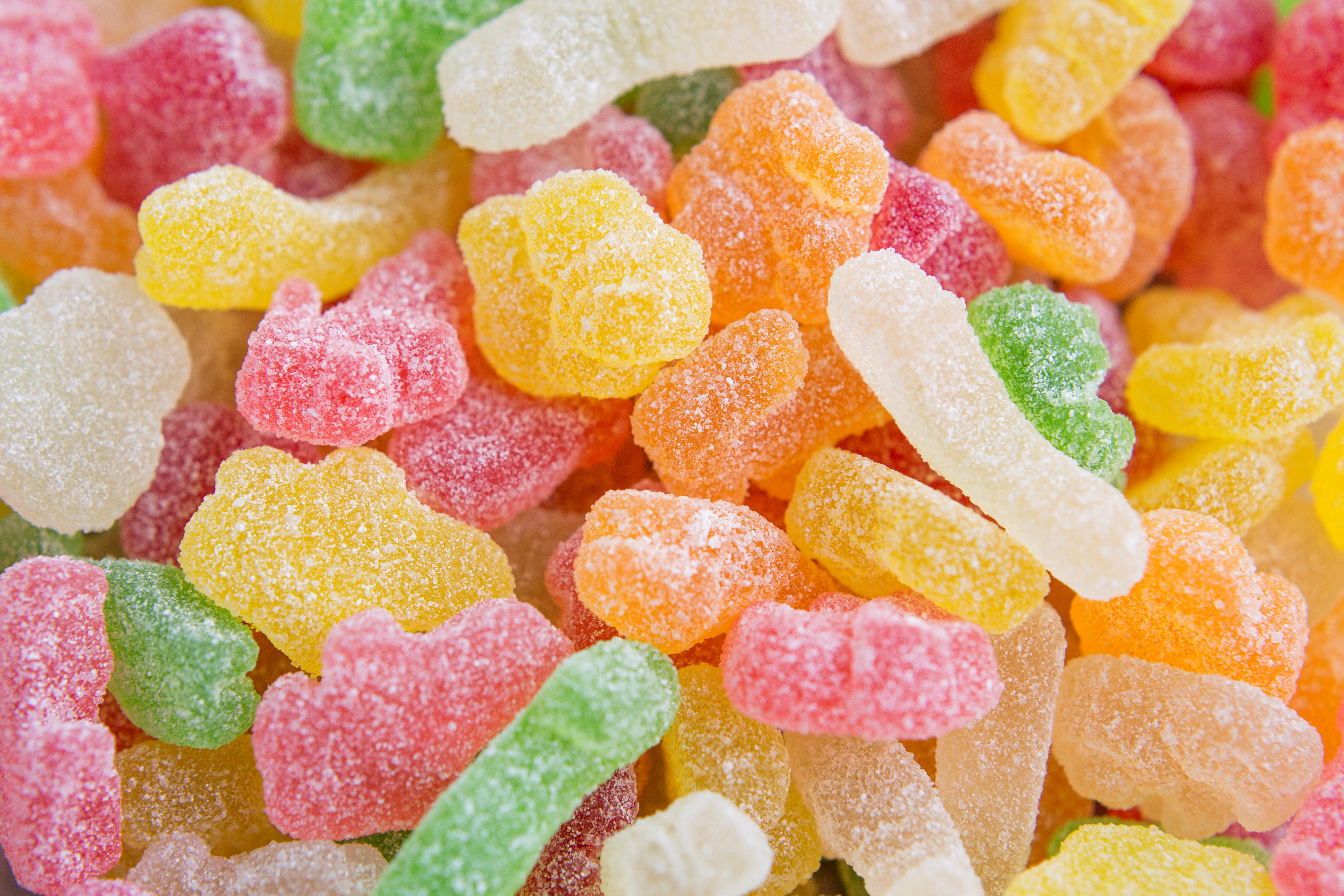 multicolored sour gummy candy close up